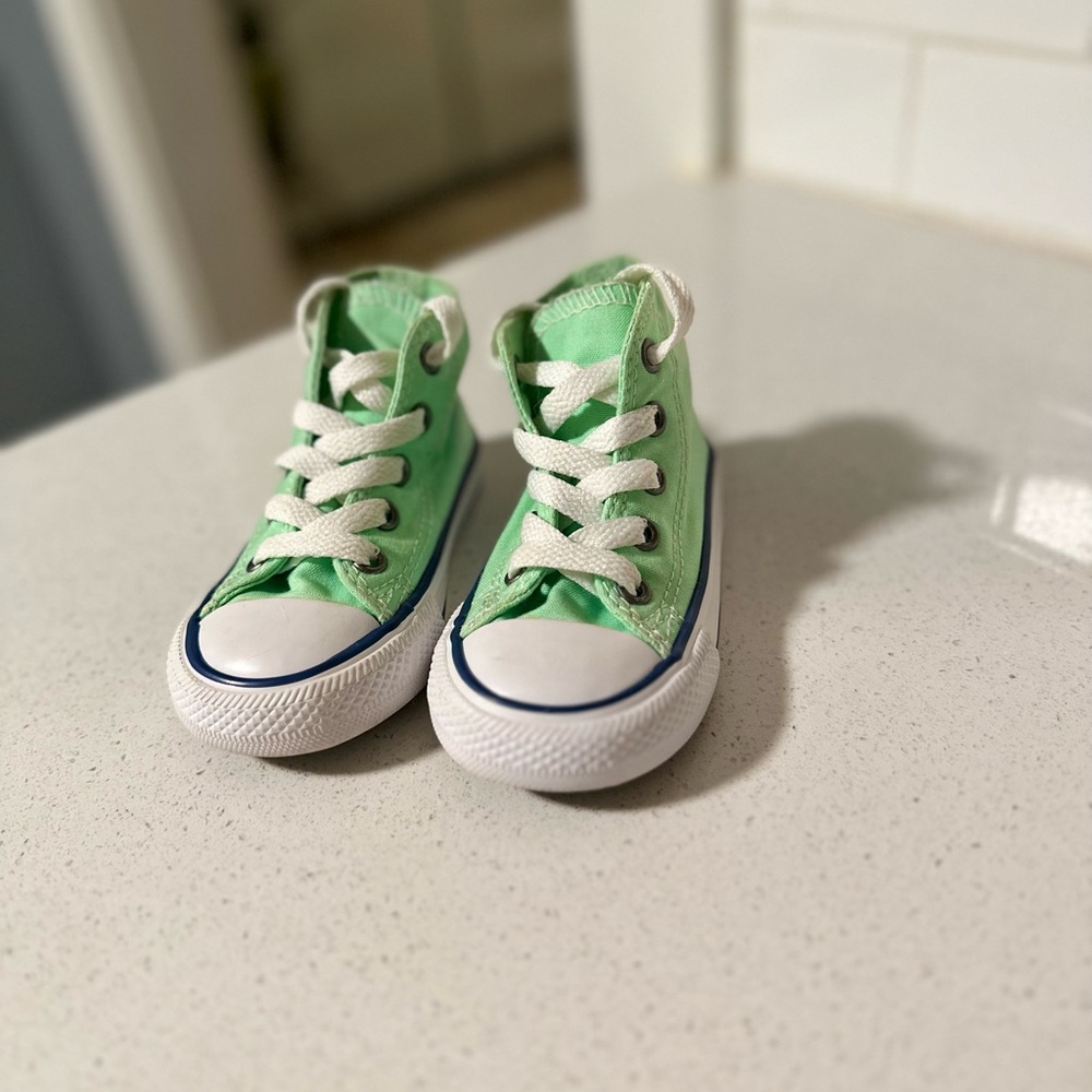 Light green Converse high tops